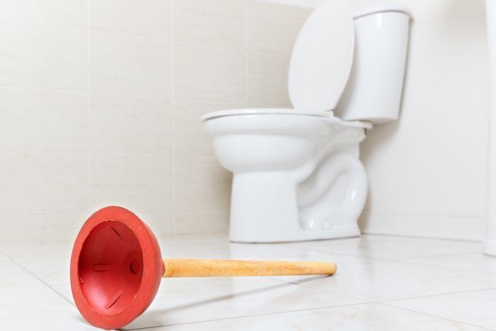 Fix A Clogged Toilet with Plungers